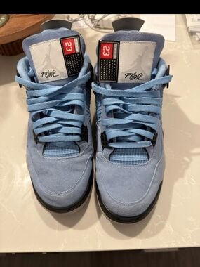 Air Jordan 4 Retro University Blue Suede Sneakers